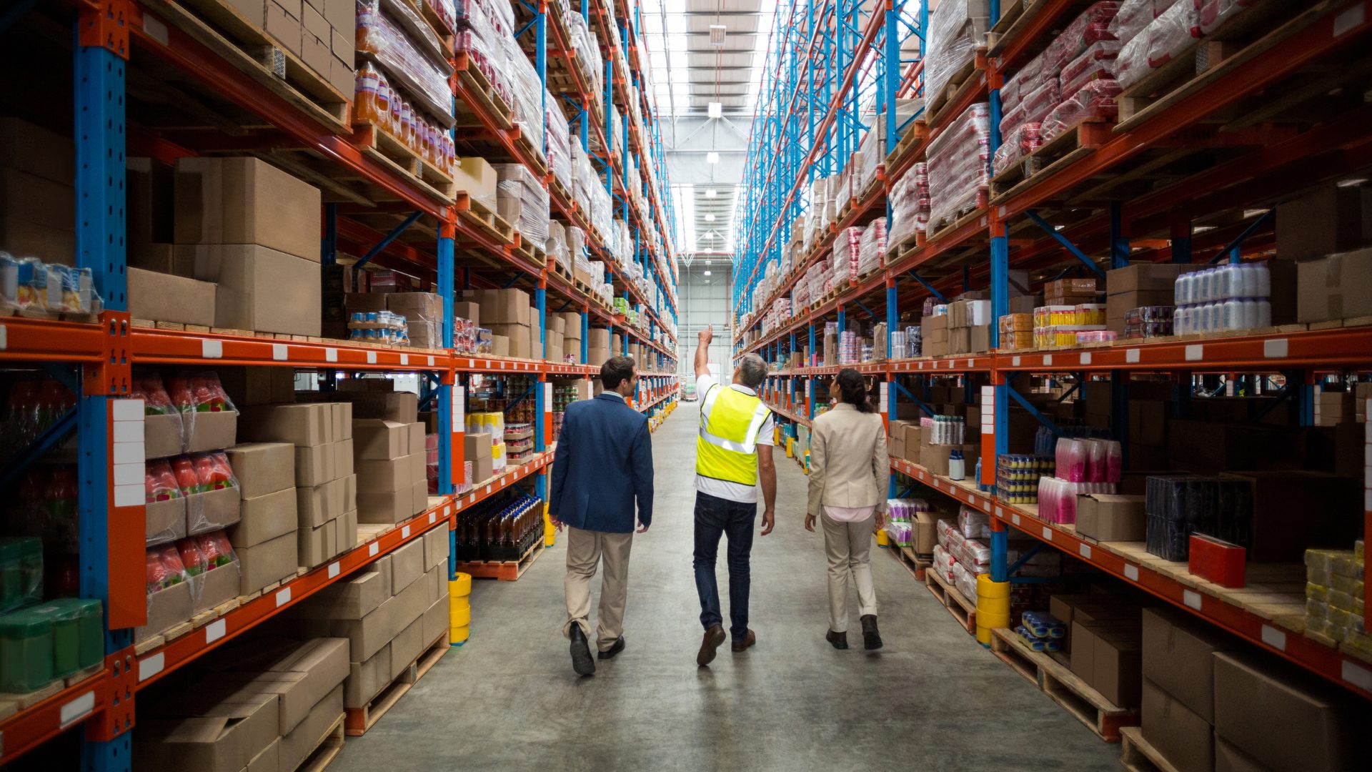 people touring warehouse